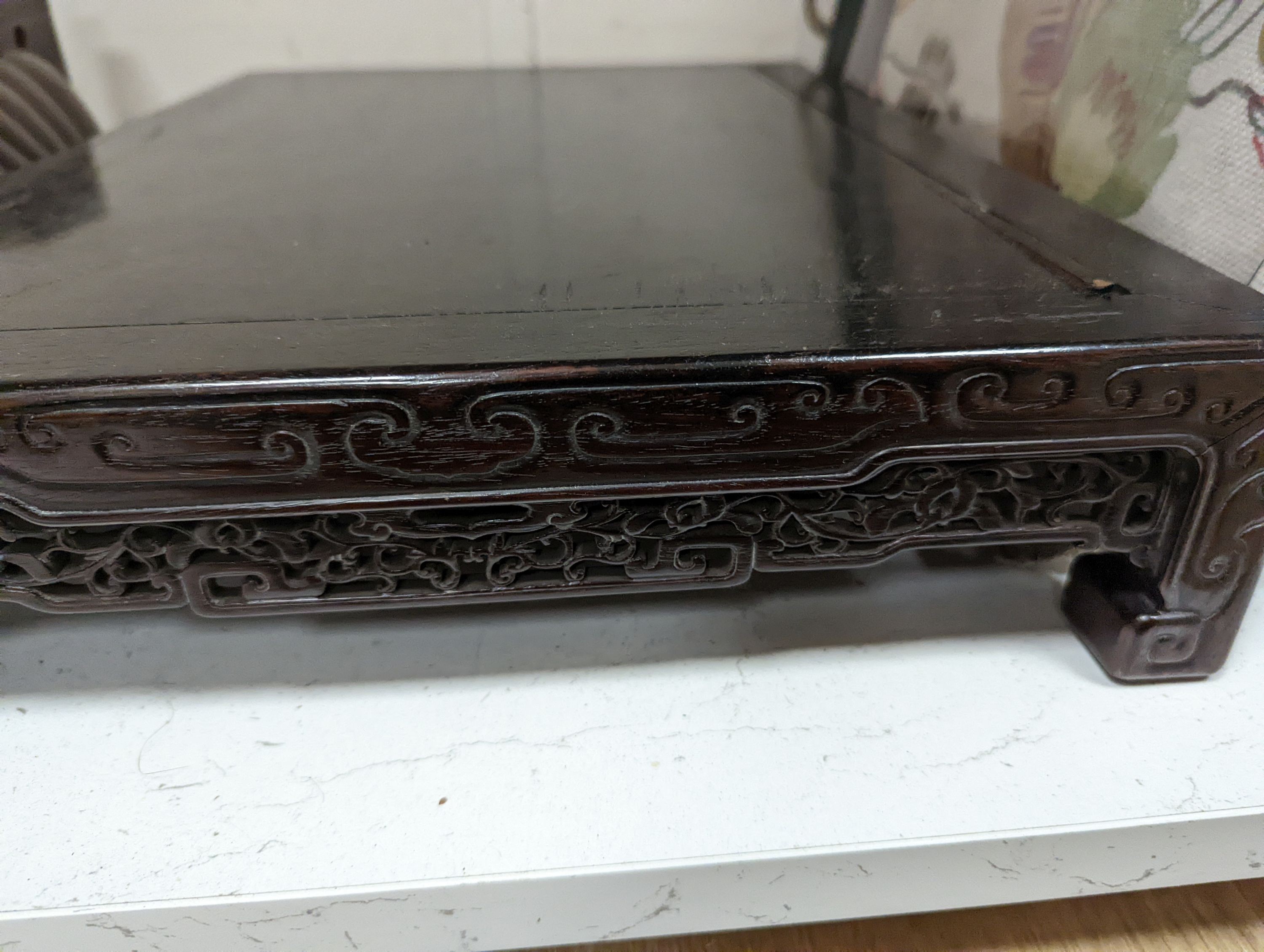 A 19th century Chinese hongmu low stand - 51cm long